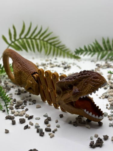 (красный) Игрушка Хваталка Динозавр (телескопическая пружинная маневрирующая клипса) фото 5